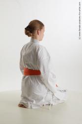 Sportswear Woman White Kneeling poses - ALL Slim Kneeling poses - on both knees long brown Standard Photoshoot  Academic